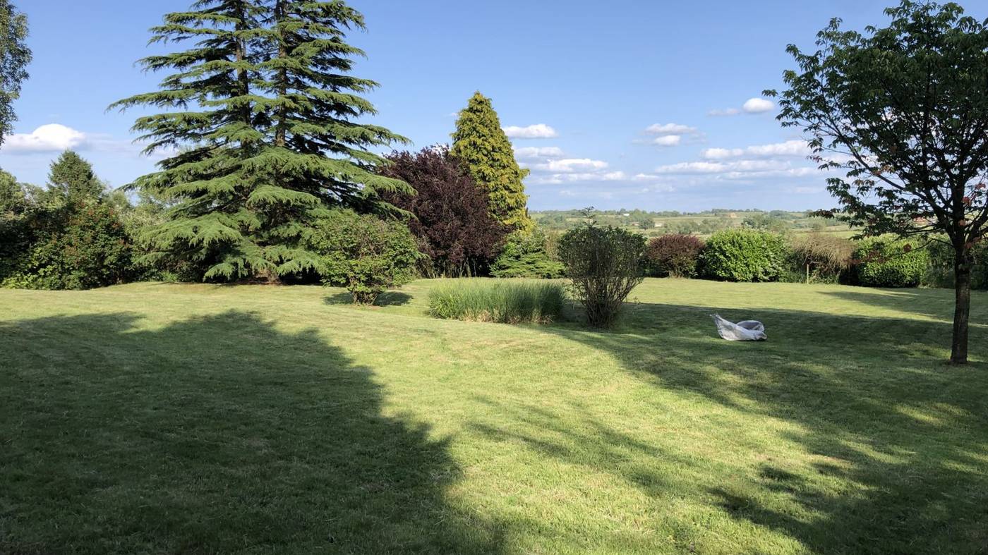 Freshly mown striped lawn with countryside views in Leicestershire